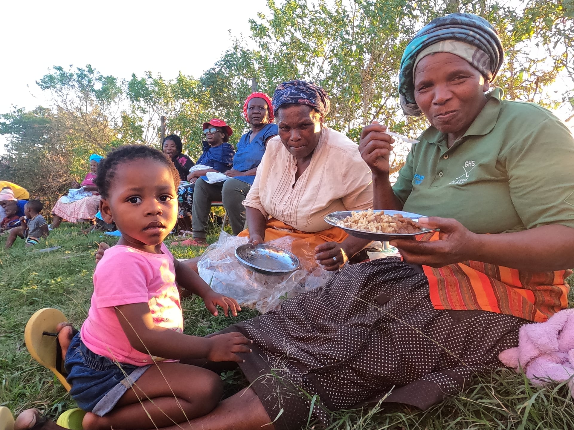 Mother and child sharing a community meal