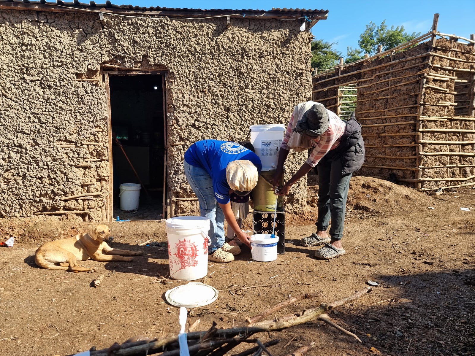 Family learning how to install and use a PureFlow filter