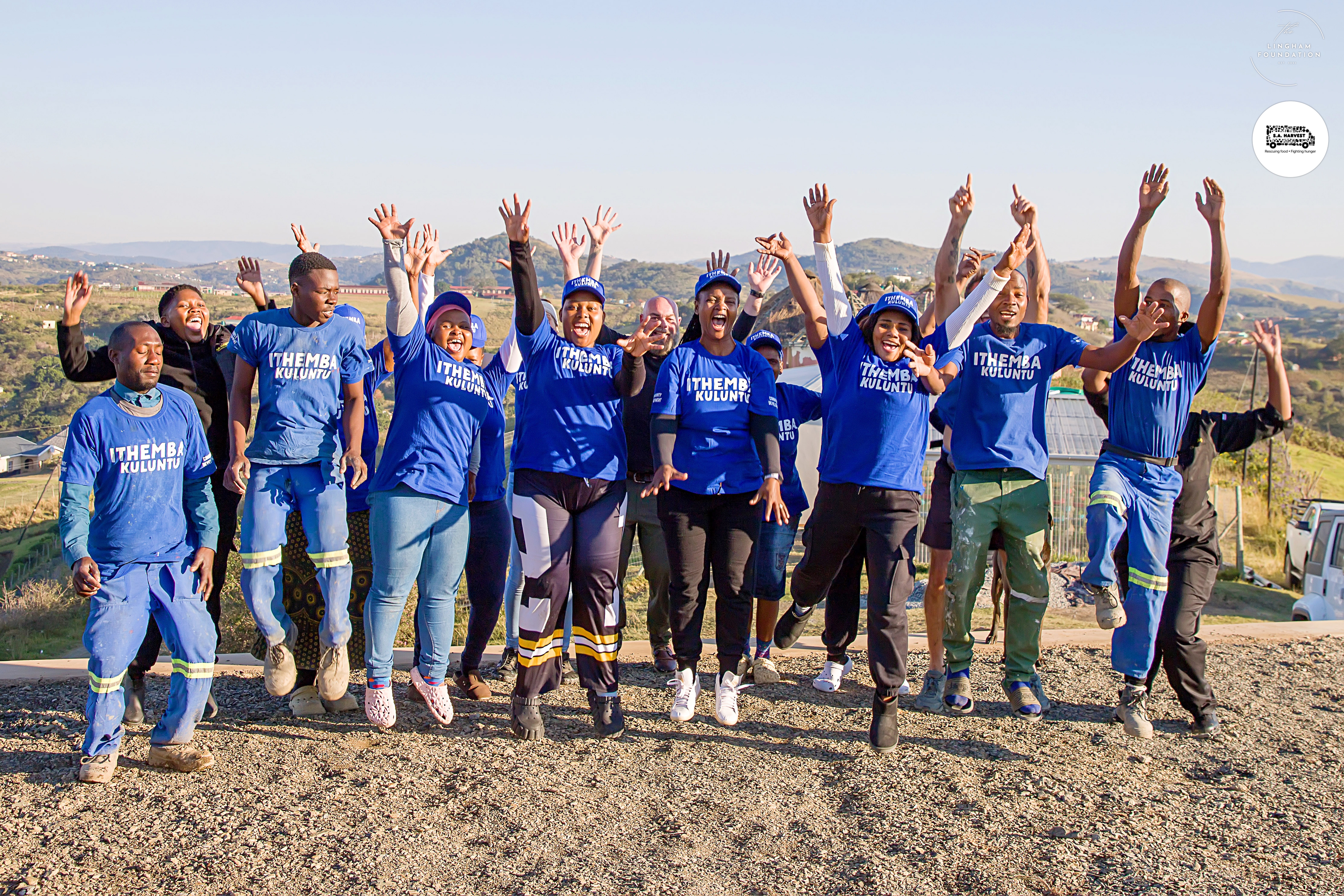 iThemba Kuluntu team jumping together