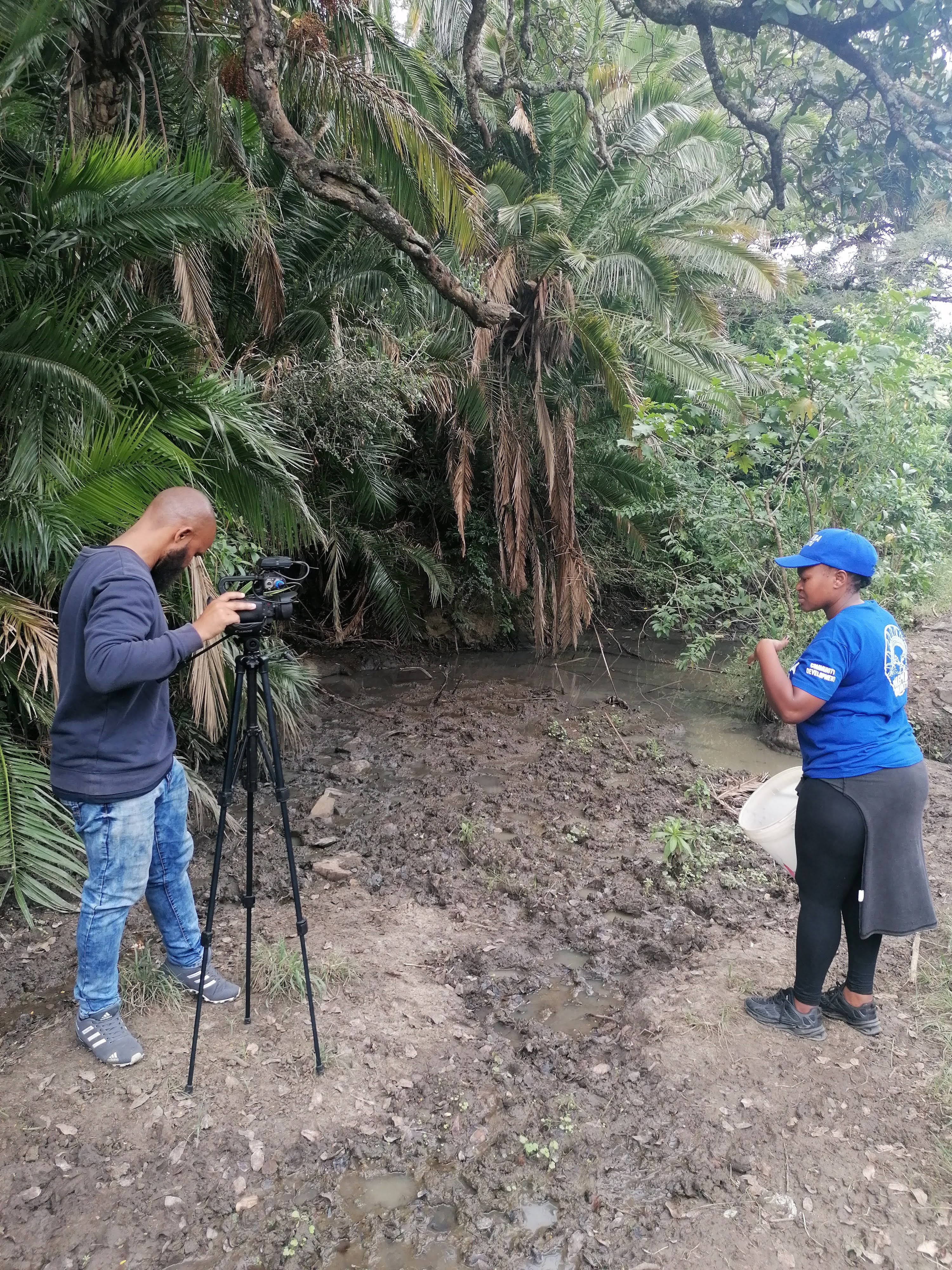 Filming at a water source in Cwebeni