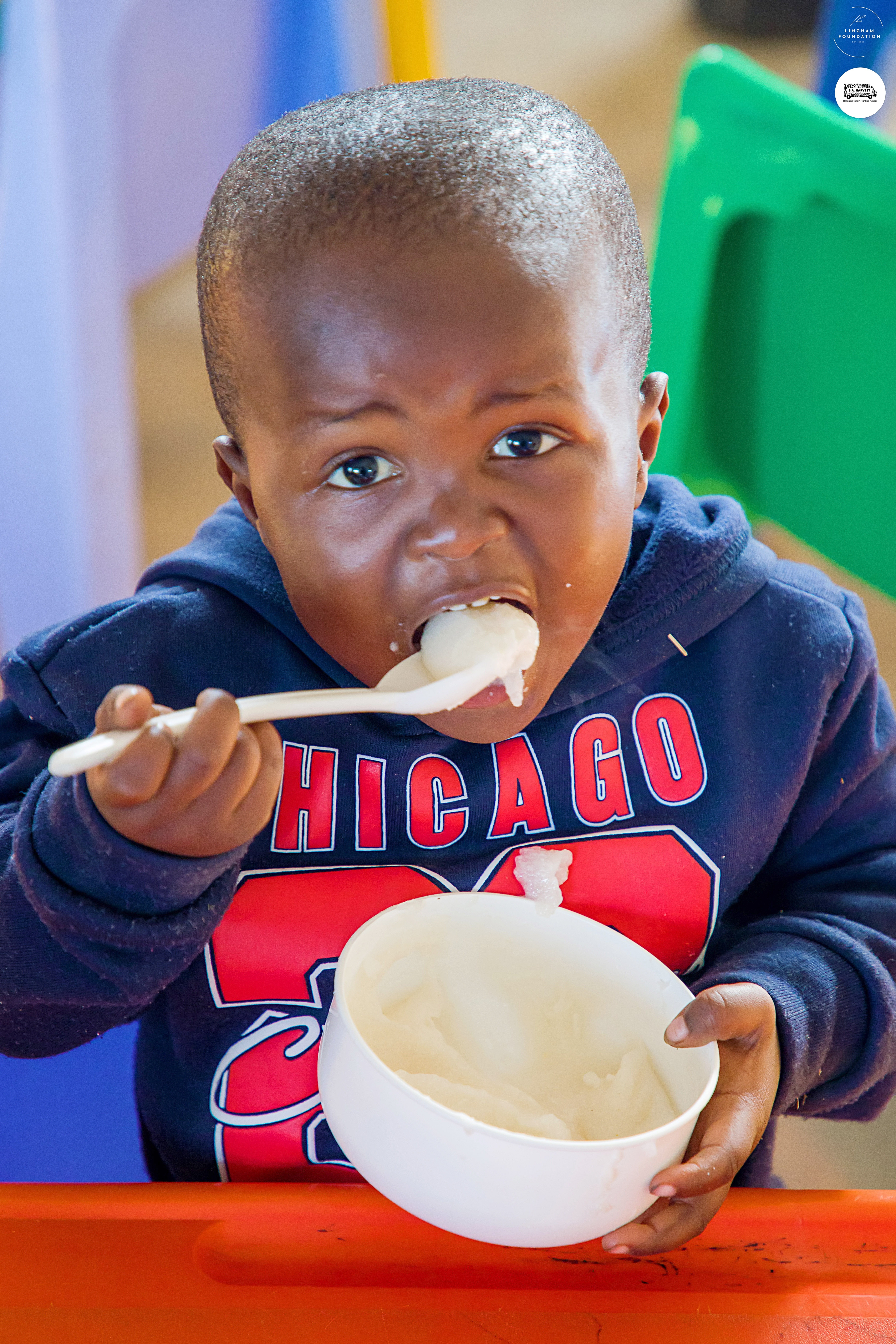 A boy eating his morning porridge