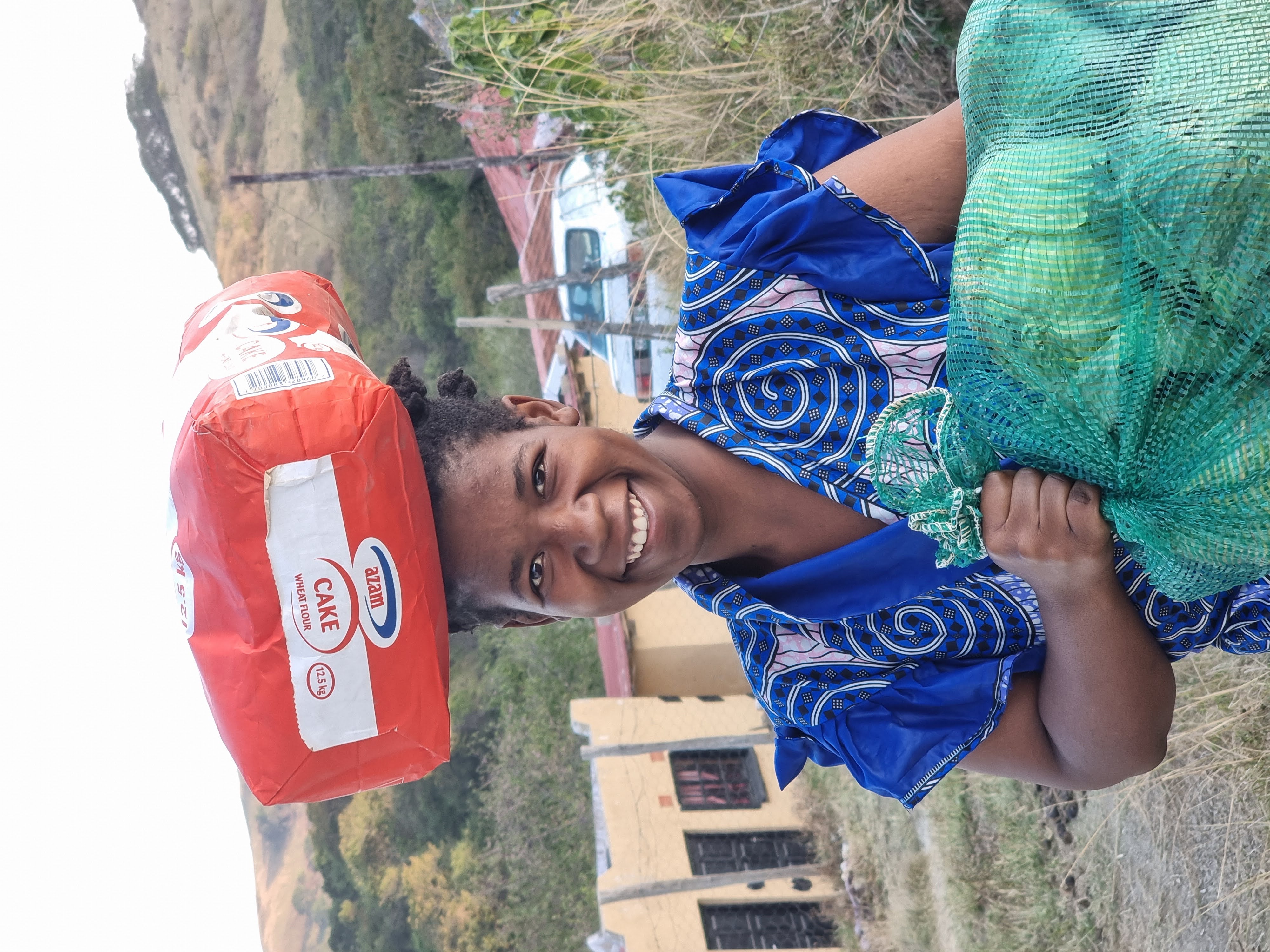 Woman receiving a food parcel