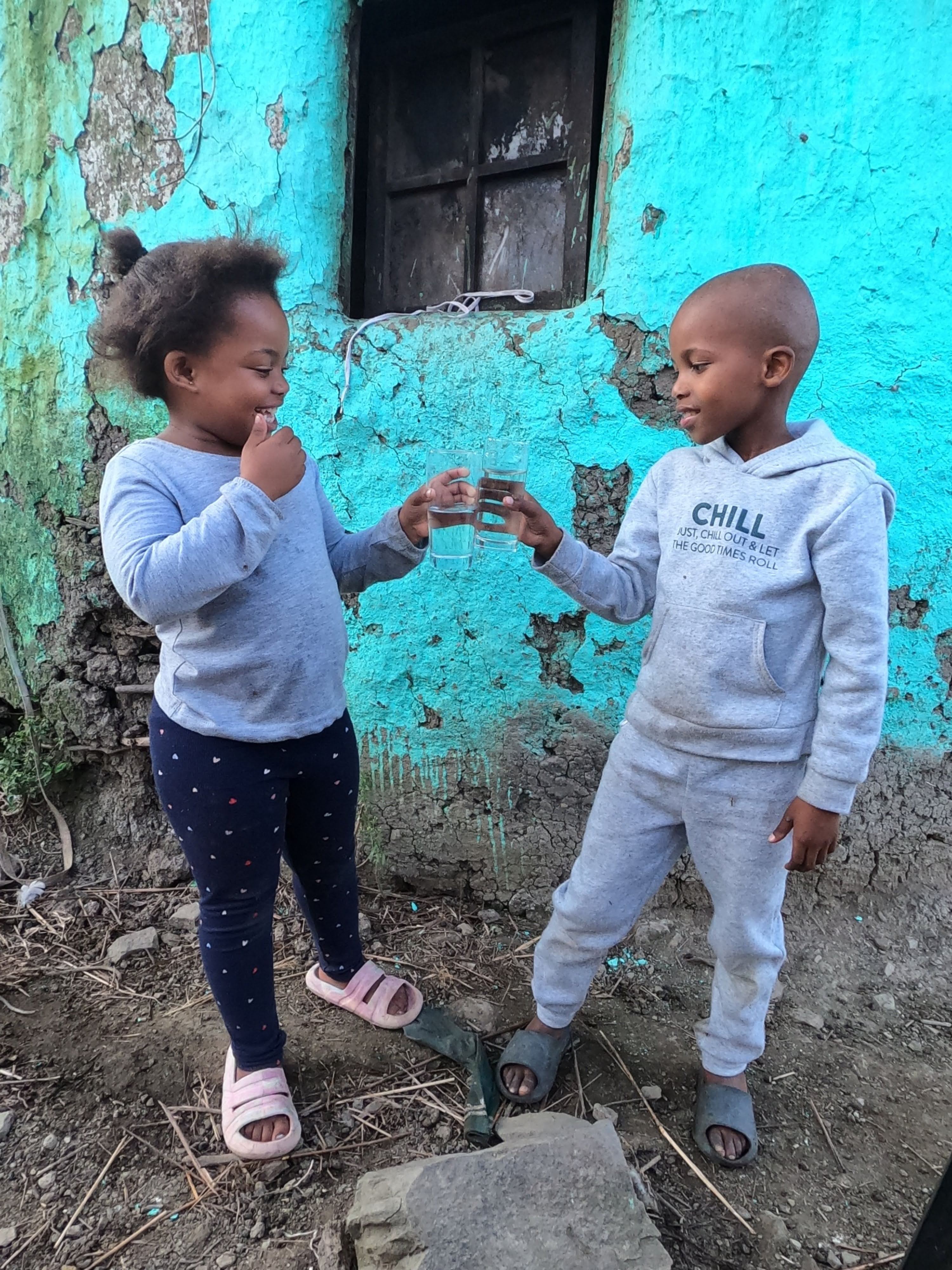 Children drinking freshly filtered water