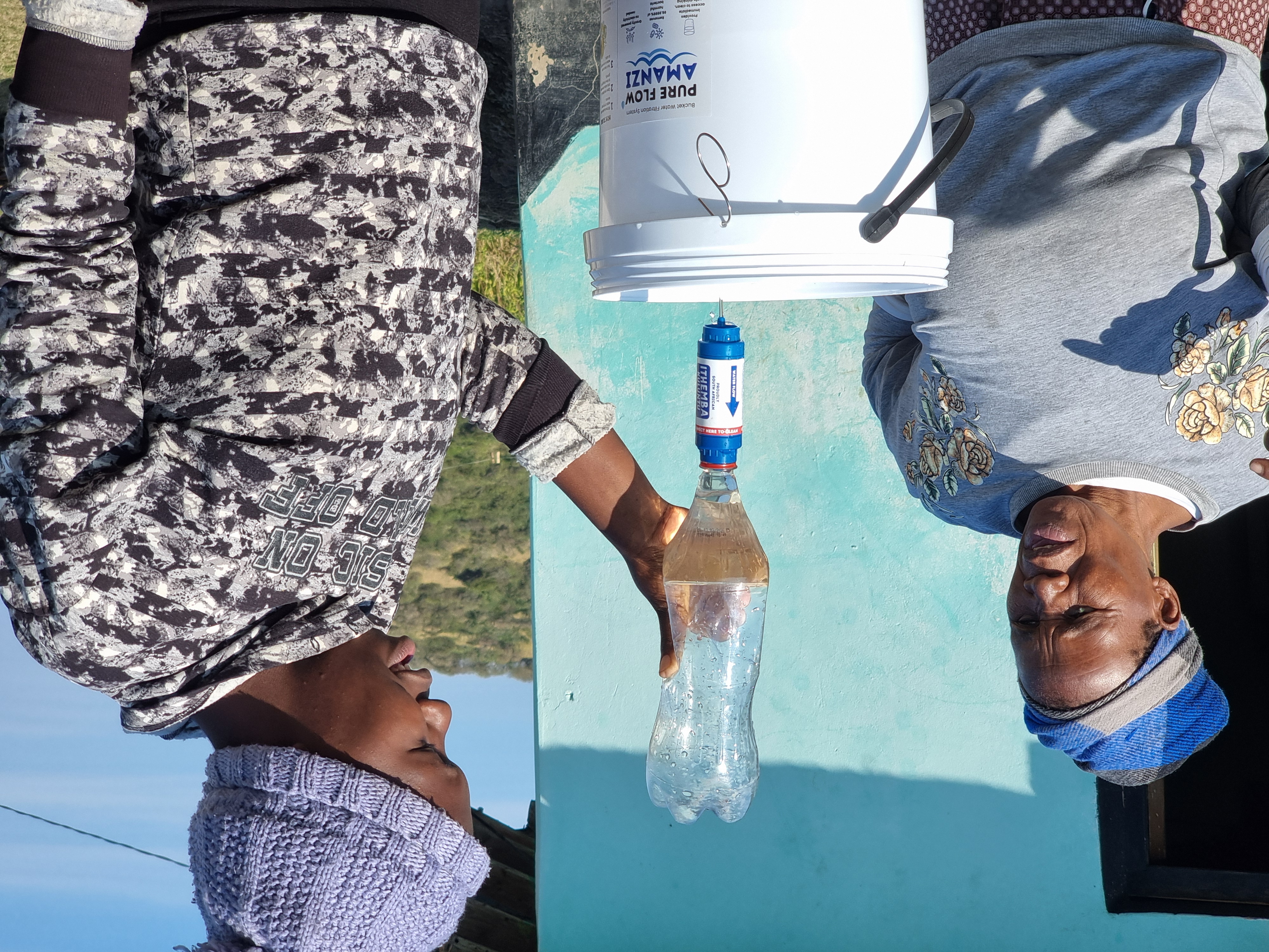 Filter backwash demonstration during a home visit